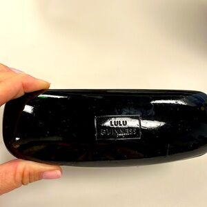 Lulu Guinness eye or thin Sunglass holder shiny black